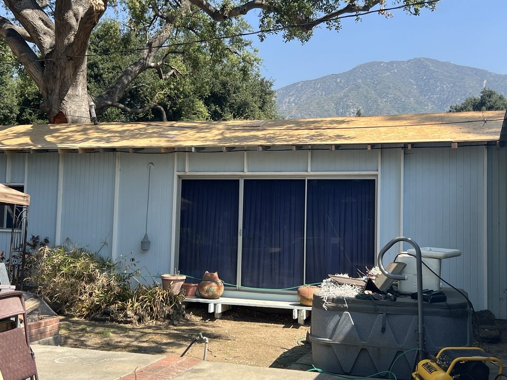 Slide of Musulman Roofing