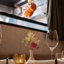 Essential by Christophe - A table set for dinner at Essential by Christophe. In the dining room on Manhattan's Upper West Side.