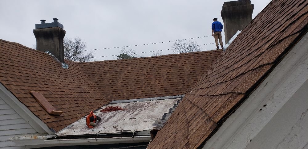 Slide of Ram's Roofing Service