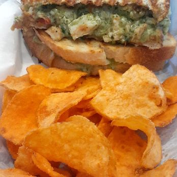 Plate 21 - Chicken Pesto Panini. Wow. Cheesy and good sourdough bread. Buffalo chips were crunchy and perfectly seasoned. - Coffee & Tea Near Me - Toledo, Ohio