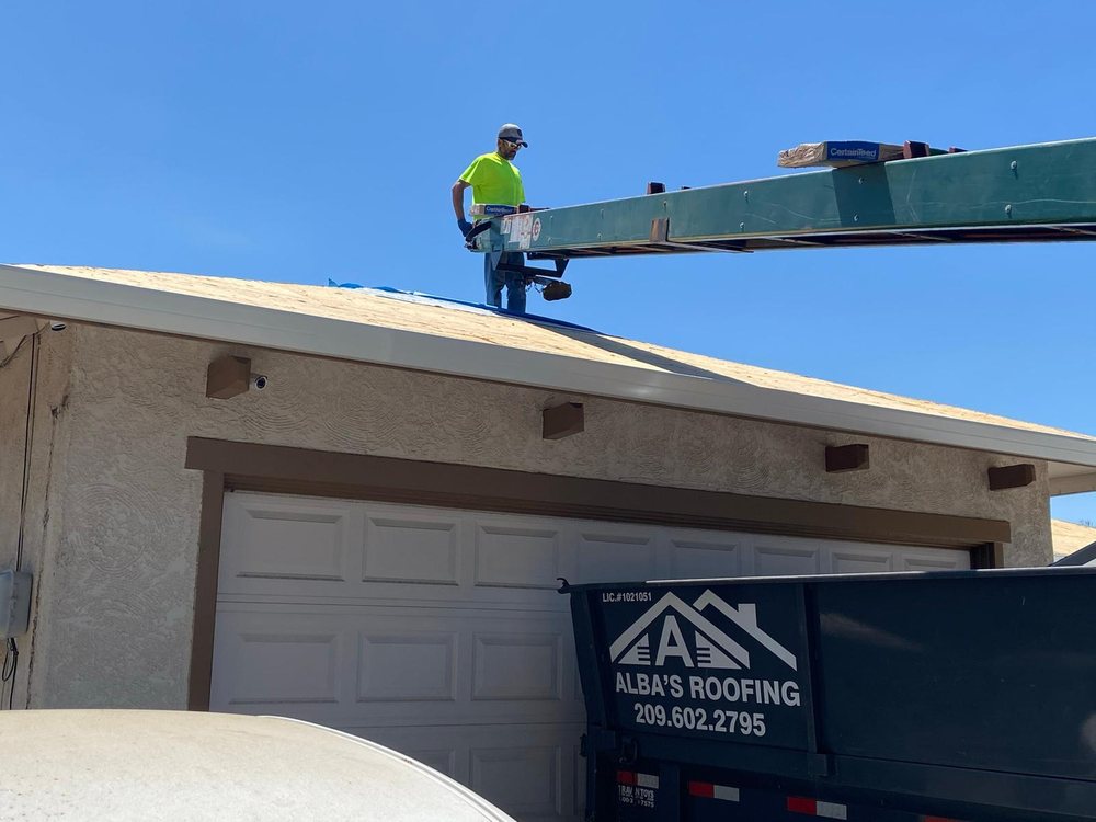 Slide of Albas Roofing