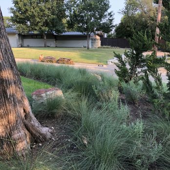 J bell Services - a view of a backyard with a fire hydrant in the foreground - Holiday Decorating Services Near Me - Farmers Branch, Texas J bell Services - a view of a backyard with a fire hydrant in the foreground - Holiday Decorating Services Near Me - Farmers Branch, Texas