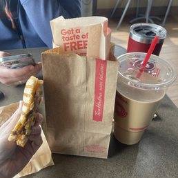 Our order: iced coffee, two donuts in the bag, and the steak & cheddar panini.