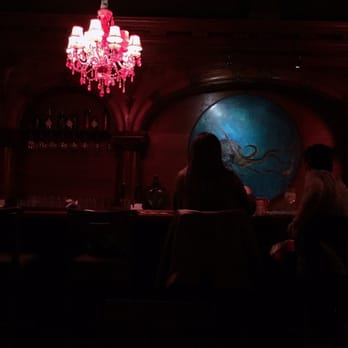 Manzanilla - Pink chandelier, bar, octo painting - Mexican Near Me - Ensenada, BCN Manzanilla - Pink chandelier, bar, octo painting - Mexican Near Me - Ensenada, BCN