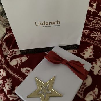 Läderach - Pralines 24 pcs in white tin can - Chocolatiers & Shops Near Me - San Diego, California Läderach - Pralines 24 pcs in white tin can - Chocolatiers & Shops Near Me - San Diego, California