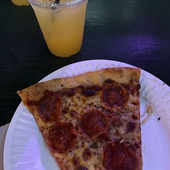 Rampart Treehouse - Pepperoni pizza slice & The Tracy. - Pizza Near Me - New Orleans, Louisiana Rampart Treehouse - Pepperoni pizza slice & The Tracy. - Pizza Near Me - New Orleans, Louisiana