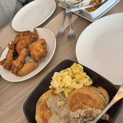 Biscuits and gravy, fried chicken, macaroni, fries, coleslaw