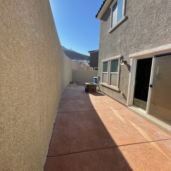 Happy Wall - 600 sqft of retaining wall repaired, stucco, and painted - Drywall Installation & Repair Near Me