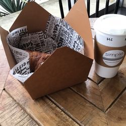 Simple Cafe - Ham and cheese croissant with hot beverage.