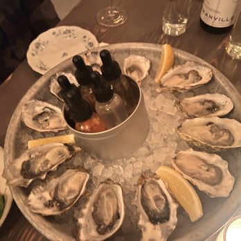 Jacqueline - oysters on the half shell w/ their hot sauce & vinegars - Cocktail Bars Near Me - Portland, Oregon Jacqueline - oysters on the half shell w/ their hot sauce & vinegars - Cocktail Bars Near Me - Portland, Oregon