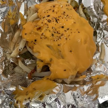 Chicago Pizza Kitchen - Colder nacho cheese dumped on top.   These were supposed to be garlic seasoned french fries with roasted green chili and mozzarella cheese. - Pizza Near Me - Albuquerque, New Mexico