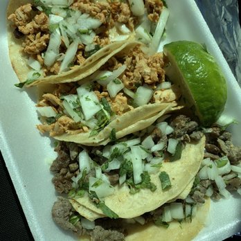 Nin's 5 Tacos - a plate of tacos and a lime - Food Trucks Near Me - Groveland , Florida