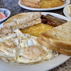 The Dakotan Restaurant - 2 Eggs, Meat of Choice (Sausage Links), Hashbrowns and Toast Breakfast
