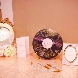 They created the sticker on the vinyl record for guests to sign. They created the sticker on the vinyl record for guests to sign.