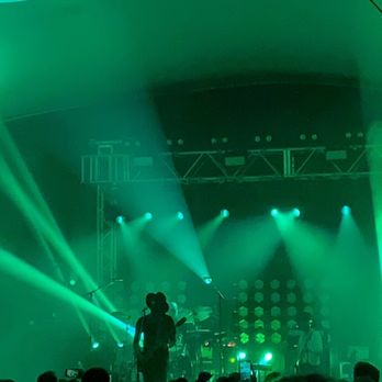 Stubb’s Waller Creek Amphitheater - a band performing on stage - Music Venues Near Me - Austin, Texas Stubb’s Waller Creek Amphitheater - a band performing on stage - Music Venues Near Me - Austin, Texas