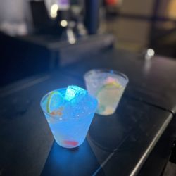 Happy Hour Mobile Bartending Service - This Signature cocktail has light up ice cubes & Gummi worms to compliment the theme.