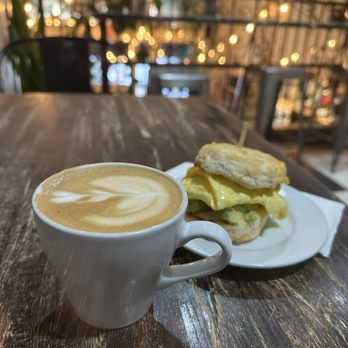 Brewed Cafe & Pub - 8oz oatmilk latte and a breakfast sandwich+avo - Coffee & Tea Near Me - Vancouver, Washington