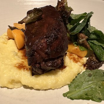Rioja - braised lamb shoulder with feta polenta, brassica salad, gooseberries, za'atar dressing - New American Near Me - Denver, Colorado Rioja - braised lamb shoulder with feta polenta, brassica salad, gooseberries, za'atar dressing - New American Near Me - Denver, Colorado