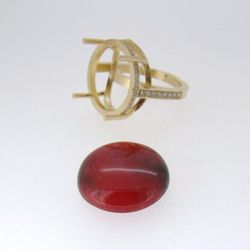 Custom Creative Gem Cutting - Rhodonite cabochon I cut and polished for a local jeweler