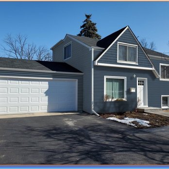 Ultimate Remodelers - LP Smartside lap Siding with Shake Accent in Gable and White Trim and Gutters-Lombard - Roofing Near Me - Villa Park, Illinois Ultimate Remodelers - LP Smartside lap Siding with Shake Accent in Gable and White Trim and Gutters-Lombard - Roofing Near Me - Villa Park, Illinois
