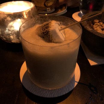 Here Nor There - Cookies and cream (The Glenlivet, horchata, vegan vanilla gelato topped with a toasted marshmallow). Perfect dessert drink. - Cocktail Bars Near Me - Austin, Texas Here Nor There - Cookies and cream (The Glenlivet, horchata, vegan vanilla gelato topped with a toasted marshmallow). Perfect dessert drink. - Cocktail Bars Near Me - Austin, Texas