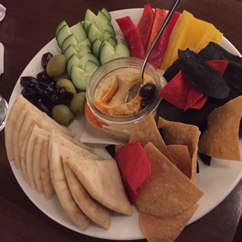 ENTERRIUM - I ordered a variation of the hummus dish. It was awesome! I love when they include kalamata olives in the hummus option. - New American Near Me - Schaumburg, Illinois