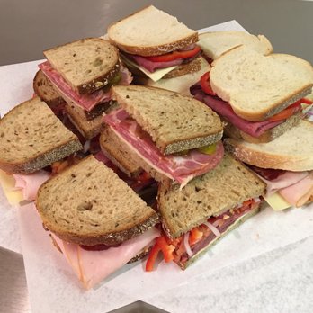 The Cottage - a pile of sandwiches on a plate - Pizza Near Me - Ayer, Massachusetts