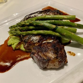 Roy's Restaurant - 04.30.21 14-oz Peppercorn Crusted Ribeye w/ spinach mashed potatoes and grilled asparagus - Seafood Near Me - Anaheim, California