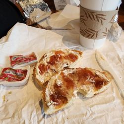 Girakofi - Bagel with cream cheese and strawberry jam and toasted coconut latte