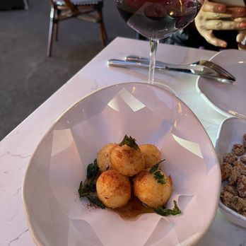 Willi's Wine Bar - Goat Cheese Fritters with Smoked Paprika & Lavender Honey - Wine Bars Near Me - Santa Rosa, California Willi's Wine Bar - Goat Cheese Fritters with Smoked Paprika & Lavender Honey - Wine Bars Near Me - Santa Rosa, California