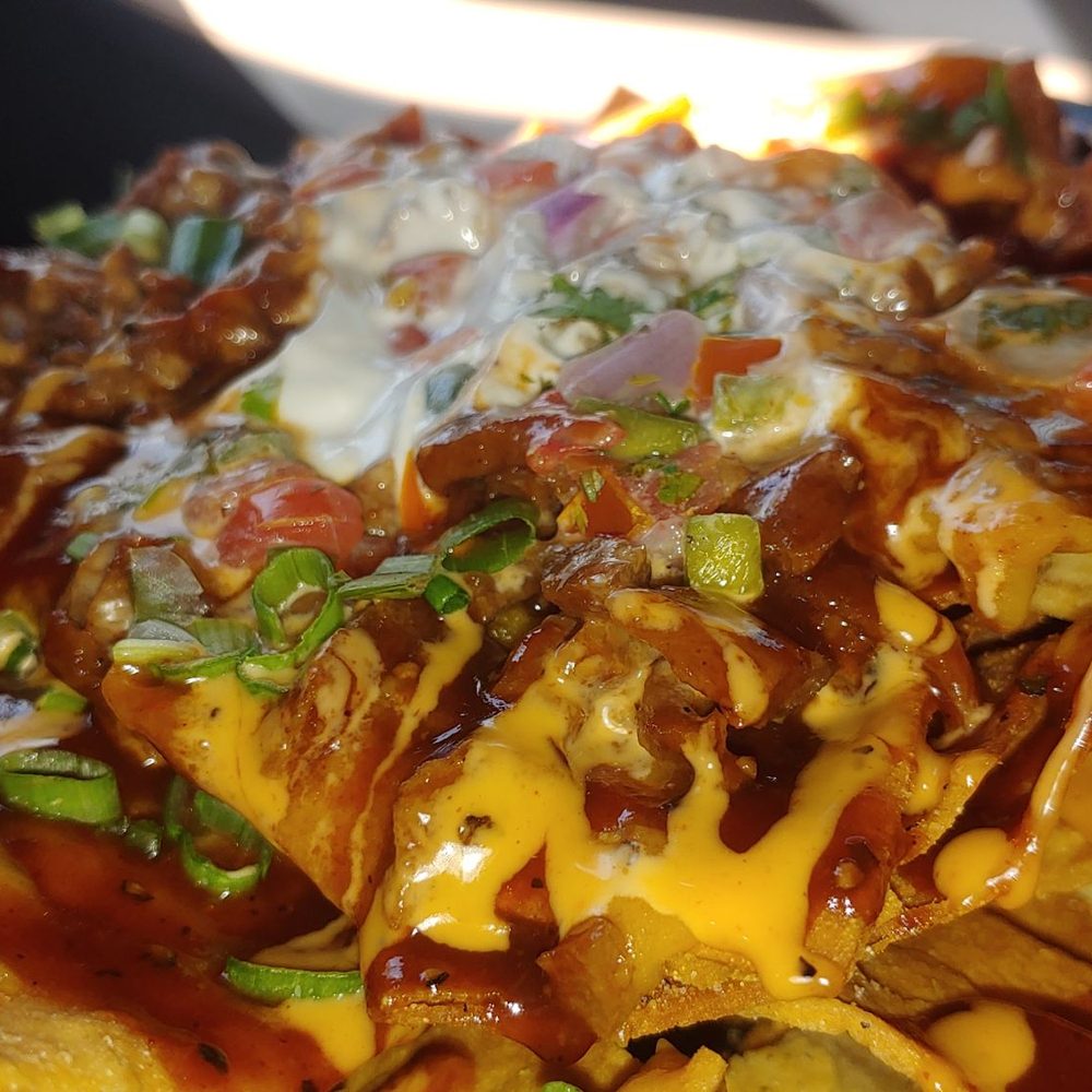 Houston Sauce Pit - Special: Trill Nachos with chopped veef. - Vegan Near Me - Houston, Texas