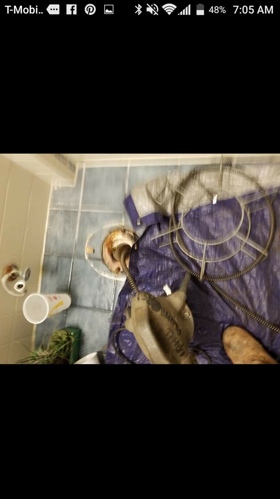 Slide of UpHill Plumbers Services