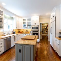Hetrick Painting - Kitchen cabinets- from old out dated wood, to modern white!