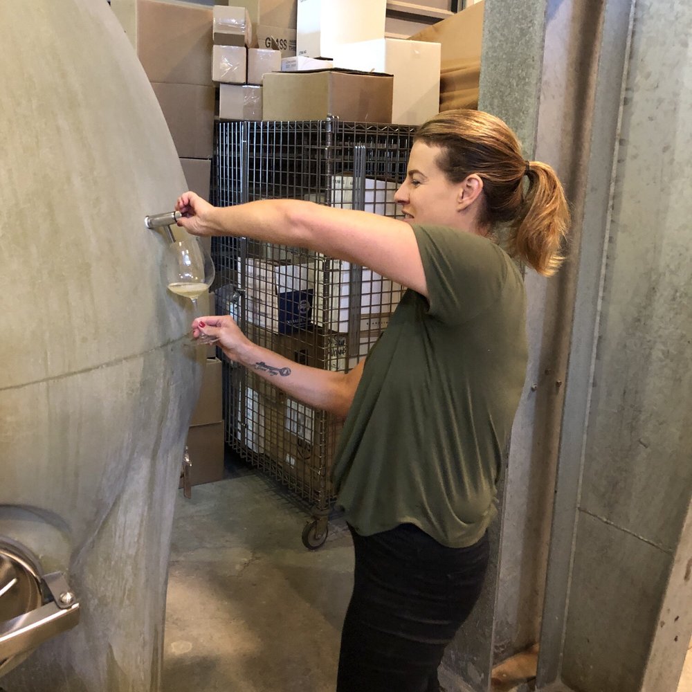 Cuvaison - Leslie pouring from the egg - Wineries Near Me - Napa, California Cuvaison - Leslie pouring from the egg - Wineries Near Me - Napa, California