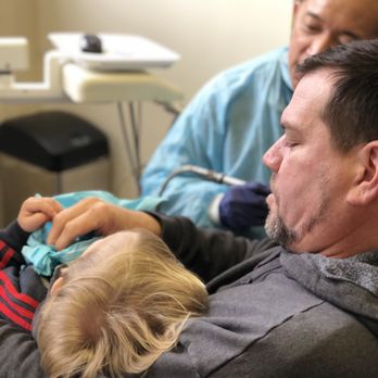 David Family Dentistry - Jack Jack laid on daddy for his cleaning. - General Dentistry Near Me - San Leandro, California David Family Dentistry - Jack Jack laid on daddy for his cleaning. - General Dentistry Near Me - San Leandro, California