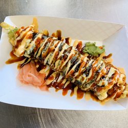 Takashimura Hibachi - Rogers - Razorback roll (shrimp tempura, cucumber, avocado eel sauce, spicy mayo and siraca sauce on top)