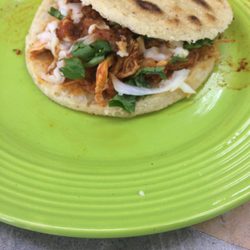 Chevron - Gorditas with shredded chicken in red sauce. Wow! This is tasty!