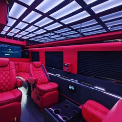 Paramount Limousine - Sprinter with captain seating, charging stations, cup holders, table, multi-TV's, Bluetooth, upgraded sound system, Fiber optic lighting