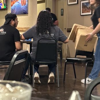 Antica Forma - Loud staff preparing pizza boxed in the middle of the restaurant. - Pizza Near Me - Moab, Utah