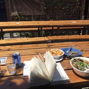 Photo of Connecticut Yankee - San Francisco, CA, United States. Fuerte Special w/ Tajín orange, Tequila and Cosmic Cider; salt &amp; vinegar fries w/ malt aioli; artichoke stuffed mushrooms; and BLT salad.