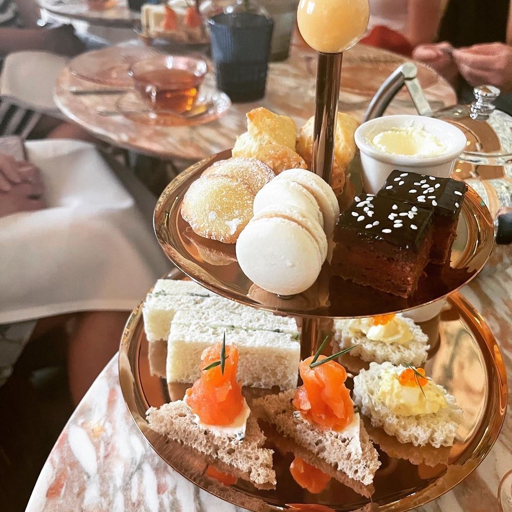 Goldie's Sunken Bar - Two tiered delicious sweets and finger sandwiches for afternoon tea - Cocktail Bars Near Me - Austin, Texas
