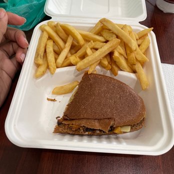 The Earthy Kitchen - Fries and the Pernil sandwich - Vegan Near Me - Orlando, Florida The Earthy Kitchen - Fries and the Pernil sandwich - Vegan Near Me - Orlando, Florida