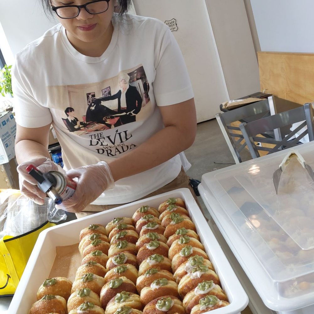 Sonrisa Donuts - Chef Jing carmelizing the sugar - Donuts Near Me