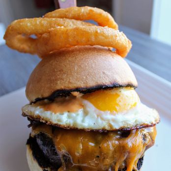 Season - he "KAF" Burger Wagyu, short rib & brisket blend, caramelized onions, maple bacon, fried egg & sharp cheddar on a brioche bun sriracha ranch - New American Near Me - Glen Head, New York