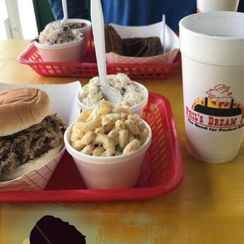 Phil's Dream Pit - Forefront - pulled pork sammie, mac salad and coleslaw, background brisket, beans and coleslaw - Barbeque Near Me - Kingsport, Tennessee