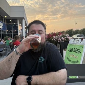 Kros Strain Brewing - Husband enjoying an Oktoberfest - Breweries Near Me - La Vista, Nebraska Kros Strain Brewing - Husband enjoying an Oktoberfest - Breweries Near Me - La Vista, Nebraska
