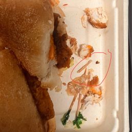 Broken toothpick pieces inside sandwich. Broken toothpick pieces inside sandwich.