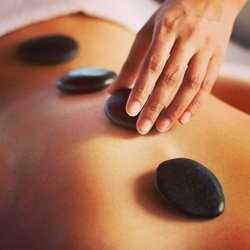 Hot stone massage therapy melts away tension, eases muscle stiffness and increases circulation and metabolism. It also promotes deeper mu