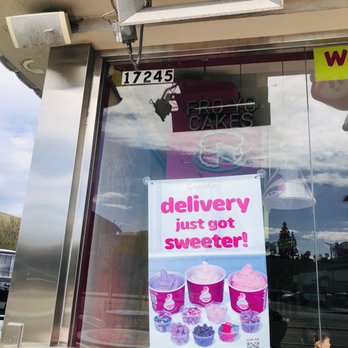 Menchie's - a sign in the window of a store - Ice Cream & Frozen Yogurt Near Me - Encino, California Menchie's - a sign in the window of a store - Ice Cream & Frozen Yogurt Near Me - Encino, California