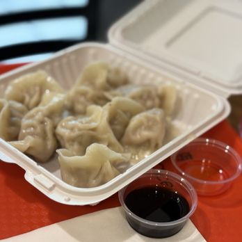 Yummy Bao - Her choice tonight: Steamed Pork Dumplings $9.50 + berry juice from Price Smart - Chinese Near Me - Richmond, British Columbia